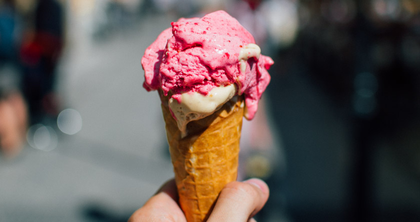 hand holding ice cream cone