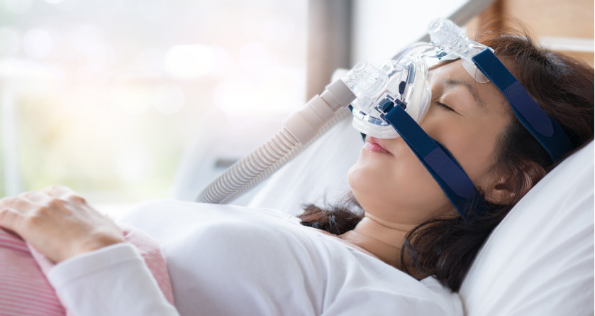 young woman in the dental chair under dental sedation