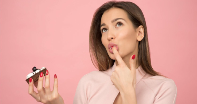 woman tasting a pastry wondering if there is a good sugar substitute