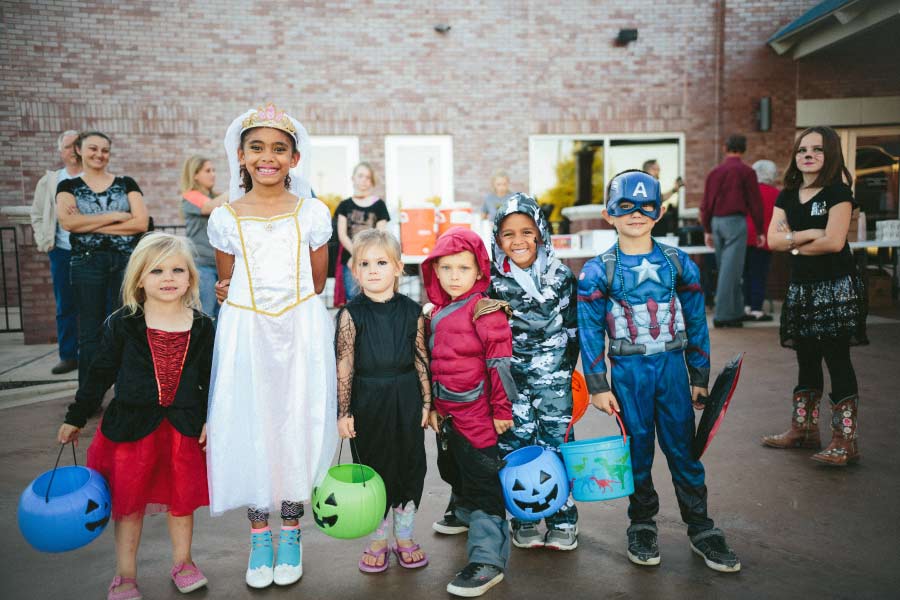 group of kids dressed up for Halloween