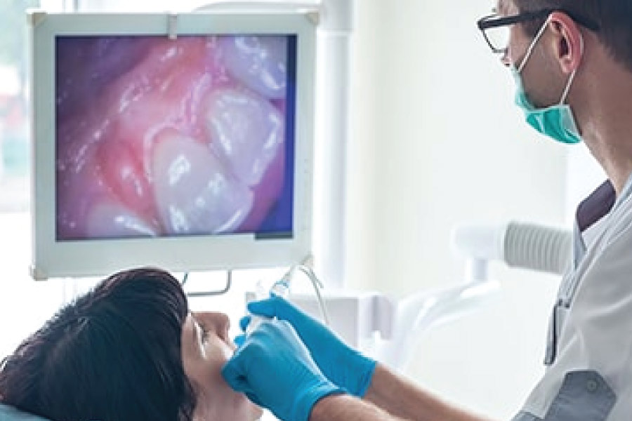 woman undergoing oral surgery using dental technolgy