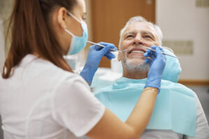 Senior patient receiving sedation dentistry in columbus